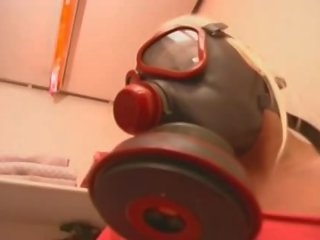 Gas Mask Wearing Euro German hooker Masturbates In The Toilet