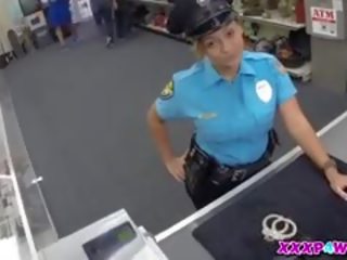Policewoman And Her Firearm