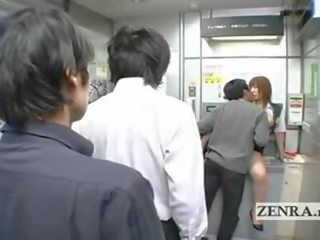 Bizarre Japanese post office offers busty oral sex video film ATM