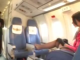Flirty stewardess sucking penis before cunnilingus